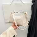 Mini cream faux leather baguette bag with crocodile embossed texture and gold buckle - Beige