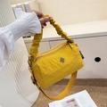 Yellow nylon cylindrical handbag with ruched handle and adjustable crossbody strap - Yellow