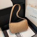 Bolso baguette marrón claro acolchado con textura de ondas y elegante cremallera dorada - Caqui