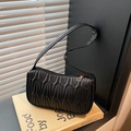 Minimalist black faux leather underarm bag with vertical wavy pleats and gold metal zipper - Black