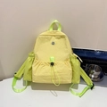 Sac à dos mode jaune clair avec contraste vert fluo et poche avant à cordon - Jaune