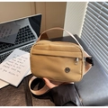 Versatile khaki nylon crossbody bag with adjustable strap and metallic logo detail - Khaki