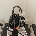 Vintage black Boston bag with leopard lining, lace bows, and cherry charms - Black