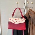 Stylish shoulder bag with red cherry prints and contrasting splicing on smooth leather - Cherry Style / Red