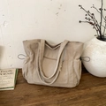 Minimalist beige corduroy tote bag with side drawstrings and front zipper pocket - Khaki