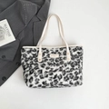 Sac fourre-tout en fausse fourrure léopard noir et gris avec anses en cuir crème - Blanc