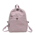Compact lavender nylon travel backpack for women with front zipper and side pocket details - Purple