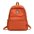Minimalist rust orange nylon backpack with front zipper pocket for school and commute - Orange