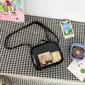 Black faux leather crossbody bag with a transparent display pocket and retro card - Patent Leather Black