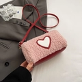 Pink plush heart crossbody bag with red leather straps and golden hardware details - Pink