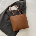 Minimalist caramel brown leather tote bag with large capacity for daily commuting - Brown