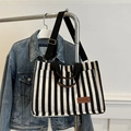 Vertical striped canvas tote bag with fashion leather patch and adjustable shoulder strap - Black