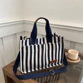 Blue and white vertical stripe canvas tote bag with fashion tag and blue straps - Blue