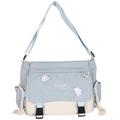 Minimalist dark aesthetic messenger bag in blue and beige with cartoon pins - Light Blue