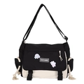 Large black and white messenger bag with cartoon patches and adjustable shoulder strap - Black