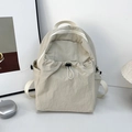 Sac à dos minimaliste en nylon crème avec poches à cordon pour le voyage et l'école - Blanc Cassé