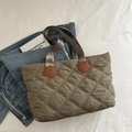 Quilted khaki tote bag with floral leather patches and grey woven shoulder strap - Green