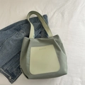 Minimalist light green nylon tote bag with contrasting yellow pocket and shoulder strap - Green