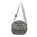 Fashionable round crossbody bag featuring black and white leopard print with adjustable strap - White