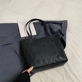 Borsa tote nera patchwork in pelle intrecciata con cuciture bianche a contrasto - Nero