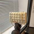 Quilted crossbody bag in cream white finish with elegant silver metal chain strap - Pearl White
