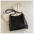 Elegante schwarze Tragetasche aus Leder mit Litschimuster und Logoprägung für Damen - Schwarz