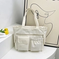 Borsa tote minimalista in velluto a coste crema con tasche e design a strisce - Bianco