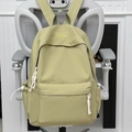 Mochila escolar minimalista verde claro con bolsillo con cremallera y nudo de cuerda blanca - Verde