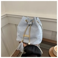 Elegant light blue velvet bucket bag with gold chain drawstring and pearl tassel charm - Blue