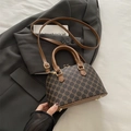 Bruine vintage schelptas met geometrische print, handvat en afneembare schouderriem - Bruin