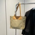 Sac cabas en toile kaki avec anses en cuir marron et coutures jaunes apparentes - Kaki
