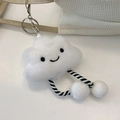 White fluffy cloud keychain with smiley face and striped legs on a large tote bag - Cloud Charm Only (Without Bag)