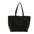 Minimalist large black tote bag in matte faux leather with vertical stitch details - Black