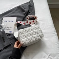 White heart-quilted crossbody bag with heart-print wide shoulder strap for women - White