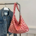Borsa hobo in tela da donna con stampa leopardata rosa e arancione e tracolla larga - Rosa
