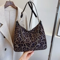 Fashionable leopard print tote bag with black leather strap and gold chain detail - Large / Brown