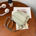 Minimalist light green canvas crossbody bag with white sausage dog and bone prints - Green