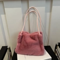 Chic pink faux fur tote bag with plush texture and matching shoulder straps for winter - Pink