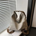 Mochila minimalista de lona gris claro para mujer con correas marrones ajustables y gran capacidad - Gris