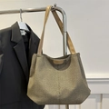 Large capacity woven tote bag with brown leather straps and branded patch detail - Green