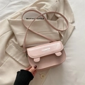 Pale pink minimalist crossbody bag with fashion print and cute ear details for women - Pink