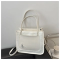 White patchwork PU leather crossbody bag featuring an elegant butterfly embroidery patch - White