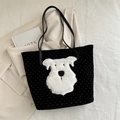 Black and white polka dot tote bag featuring a 3D plush puppy patch and shoulder straps - Black