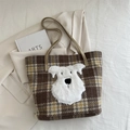 Brown plaid tweed tote bag featuring a plush white puppy patch and leather handles - Plaid Khaki