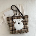 Brown plaid tote bag with a white plush dog patch and slim brown leather straps - Lattice Coffee