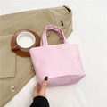 Chic light pink tote bag with retro pleated texture for stylish urban commuting - Pink
