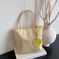 Beige nylon mini tote bag with yellow leather heart charm for casual daily use - Yellow