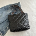 Black quilted down tote bag with a colorful ethnic patterned wide shoulder strap - Black