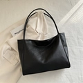 Minimalist black lychee texture tote bag for women featuring slim shoulder straps - Black