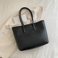Minimalist black faux leather tote bag for women with large capacity and long handles - Black